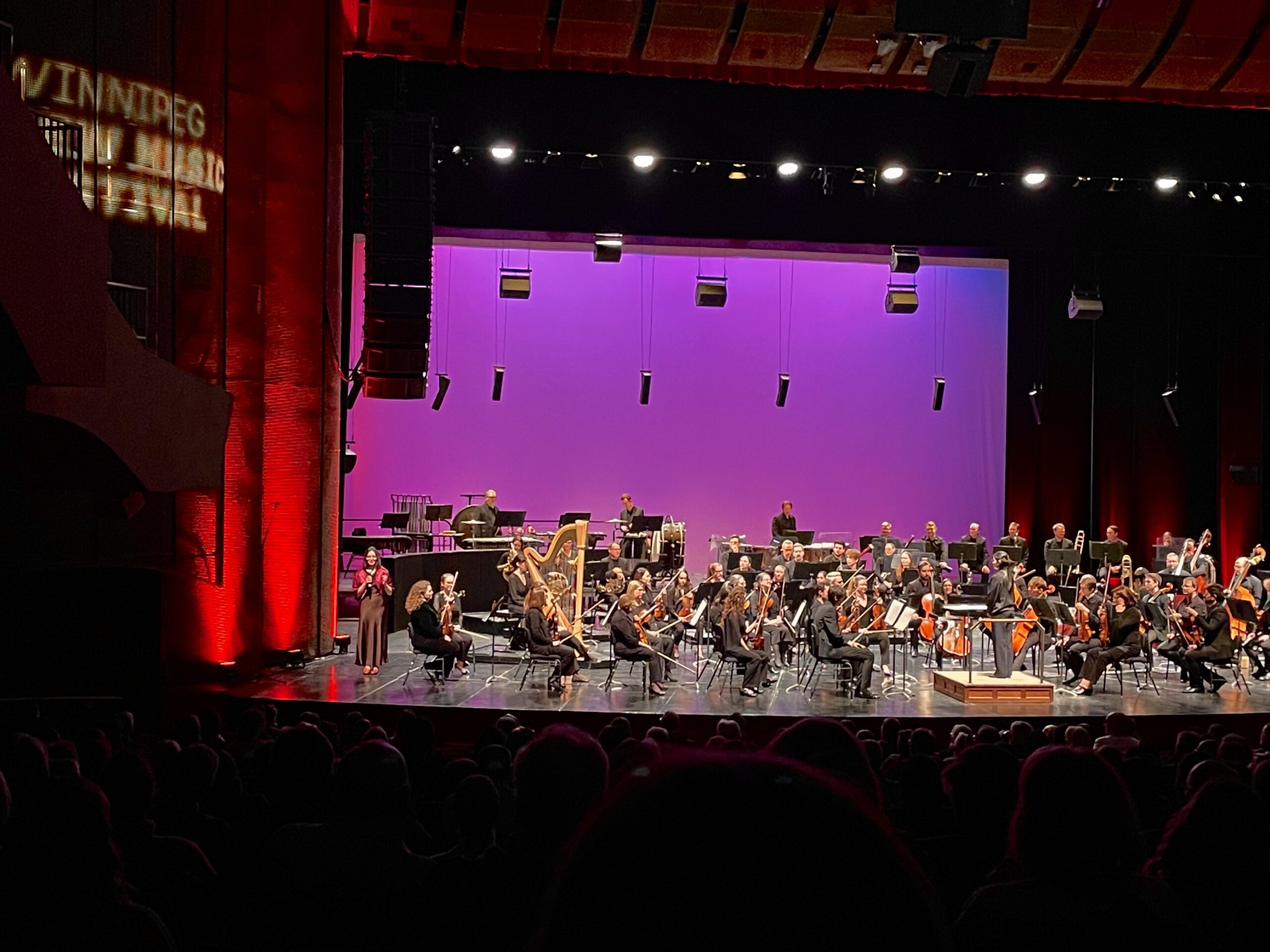 Gabriella introducing her orchestral composition, "Ode to Mourning Doves" (2025), at the Winnipeg New Music Festival on January 21st, 2026.